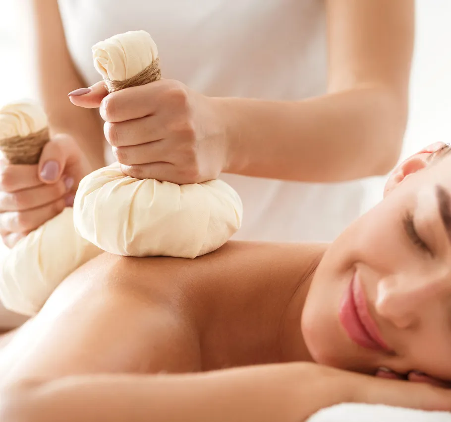 A woman relaxes with an Ayurvedic massage in the wellness area of the Grand Hotel Binz with its many Ayurveda offers.