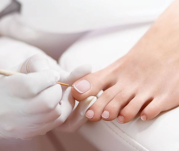 Classic pedicure with foot bath, nail care, callus removal and relaxing final treatment.