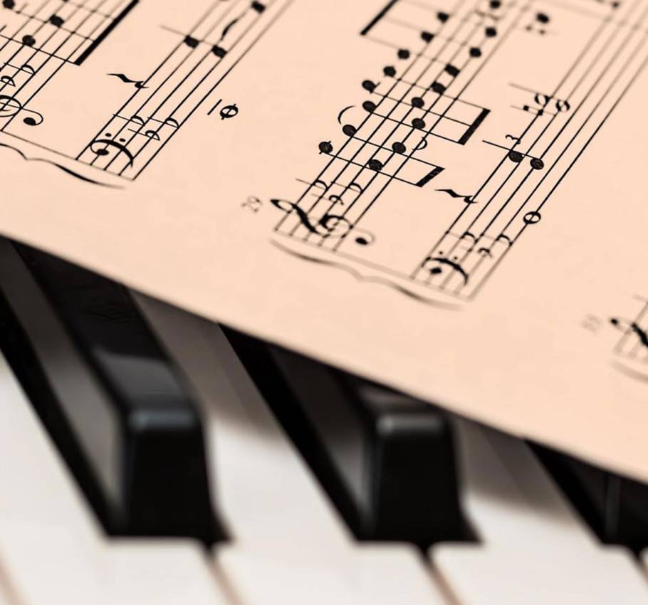 Close-up of a sheet of music on the keys of a piano at the gala evening in the Grand Hotel Binz.