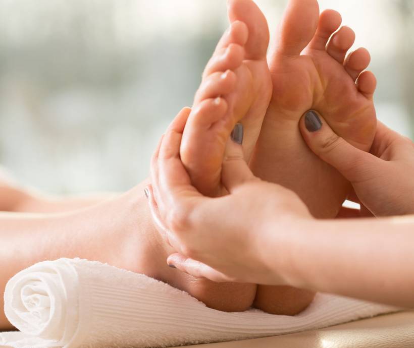 Close-up of a foot massage as part of the premium Buchinger therapeutic fasting treatment during a wellness vacation at the Grand Hotel Binz.