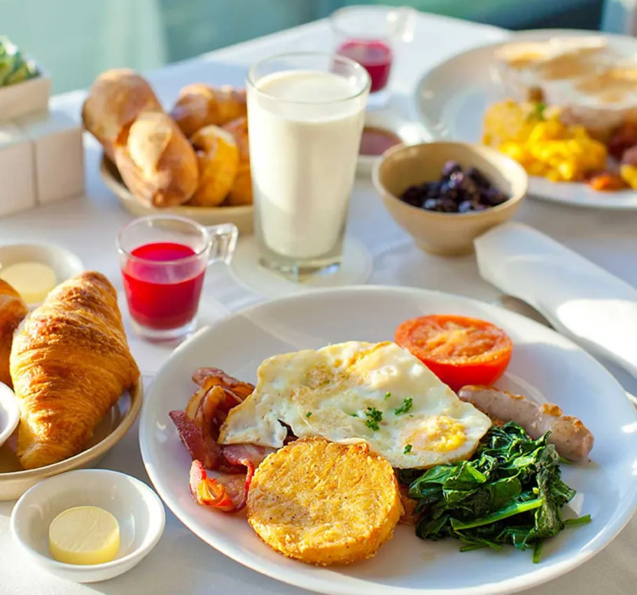 Set table with delicacies from the rich breakfast buffet, part of the “Genussmomente” offer at the Grand Hotel Binz.